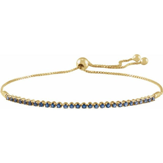 Pulsera de oro amarillo de 14k con zafiros.