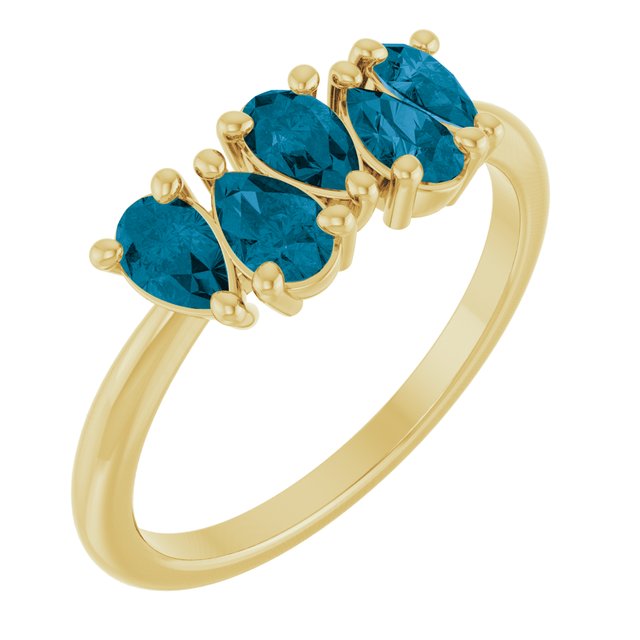 Anillos de oro amarillo de 14k con Topacios London Blue