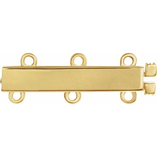 Broche de oro amarillo de 14K. Ideal para hacer layering de collares y evitar que se enreden, funciona para 3 collares. 