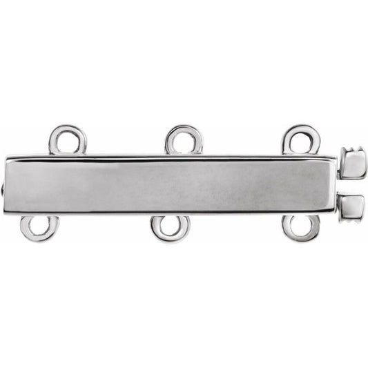 Broche de oro blanco de 14K. Ideal para hacer layering de collares y evitar que se enreden, funciona para 3 collares. 
